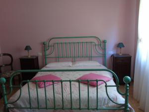 Voodi või voodid majutusasutuse Agriturismo Camera Rosa toas
