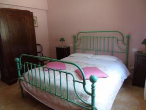 Voodi või voodid majutusasutuse Agriturismo Camera Rosa toas