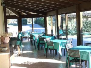 Restoran või mõni muu söögikoht majutusasutuses Agriturismo Camera Rosa