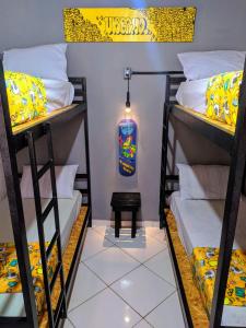 Postel nebo postele na pokoji v ubytování Maresia Hostel Paraty BR