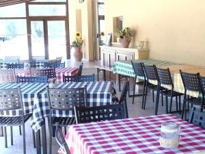 Restoran või mõni muu söögikoht majutusasutuses Agriturismo Camera Rosa