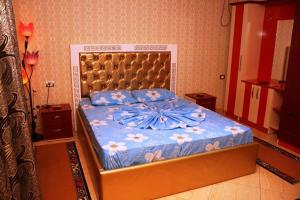 Hotel Buza 객실 침대