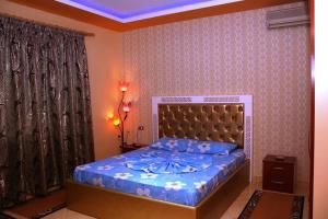 Hotel Buza 객실 침대