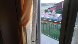Balkón nebo terasa v ubytování L'Isola Dla Cerrea