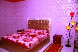 Hotel Buza 객실 침대