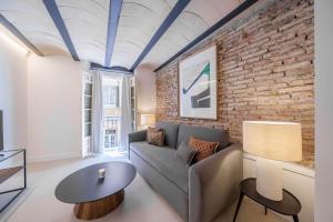 Homely Málaga Mariblanca 17, Vegafuente Apartments的休息区