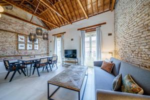 Televízia a/alebo spoločenská miestnosť v ubytovaní Homely Málaga Mariblanca 17, Vegafuente Apartments