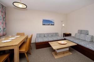 Posedenie v ubytovaní Kaprun Apartments