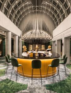 Coin salon dans l'établissement Le Louis Hotel Versailles Château - MGallery Collection