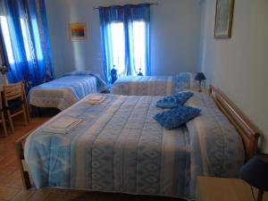 Voodi või voodid majutusasutuse Agriturismo Camera Rosa toas
