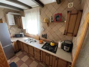 Kuchyň nebo kuchyňský kout v ubytování Relajante Casa Rural
