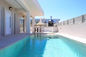 The swimming pool at or close to Villa Constantino with heated pool
