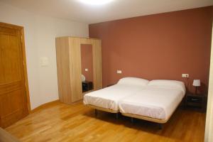 Posteľ alebo postele v izbe v ubytovaní Hostal Rural 18 de Abril
