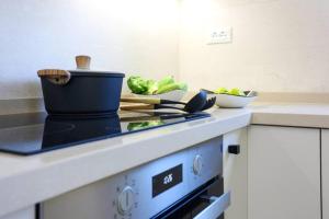 A kitchen or kitchenette at Villa Constantino with heated pool