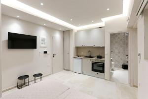 A kitchen or kitchenette at Villa Constantino with heated pool