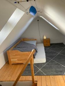 Postel nebo postele na pokoji v ubytování Ferien/ Monteurzimmer mit gemeinsam Wozi, Kü, Bad, WLAN