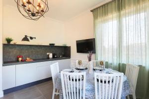 A television and/or entertainment centre at Appartamento Cloe