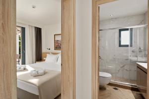 Kopalnica v nastanitvi Perithia Suites
