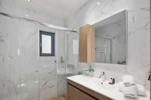Kopalnica v nastanitvi Perithia Suites