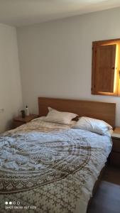 Llit o llits en una habitació de Un hogar en el Pinar