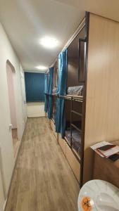 Postel nebo postele na pokoji v ubytování Bonvenon capsule Hostel