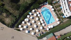 an overhead view of a resort with a swimming pool and umbrellas at Eurobeach Residence in Cavallino-Treporti