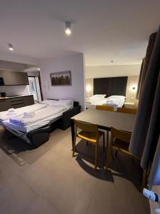 Una cama o camas en una habitación de Bilo - Apartments for rent