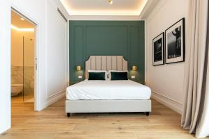 מיטה או מיטות בחדר ב-Unico Relais