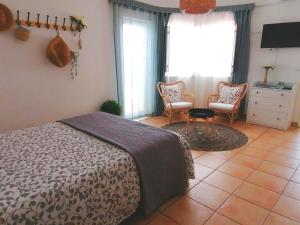 Apartamento Estúdio Pinhalmar客房内的一张或多张床位