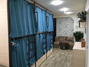 Posezení v ubytování Bonvenon capsule Hostel