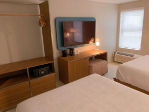 Voodi või voodid majutusasutuse TRYP by Wyndham Mayaguez toas