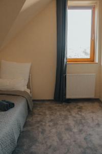 Posteľ alebo postele v izbe v ubytovaní Casa Galliera - Apartment