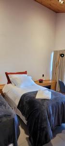 En eller flere senger på et rom på Hotel Pico 16
