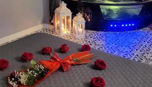 a bunch of red roses and a bunch of lights at Anzio d'aMare in Anzio