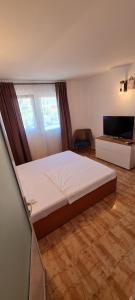 Un pat sau paturi într-o cameră la LaNoi LaVoi