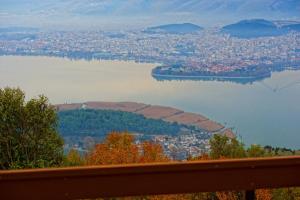 a view of a city and a body of water at Mir Boutique Hotel in Ioannina