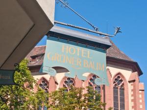 a sign that reads hotel center ballin in front of a building at Hotel Grüner Baum in Würzburg