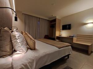 Postel nebo postele na pokoji v ubytování Hotel Lepelbed