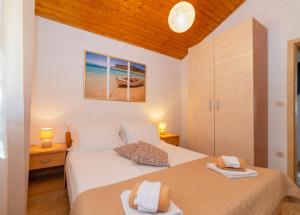 Postel nebo postele na pokoji v ubytování Villa Anabella + 33 fotografií