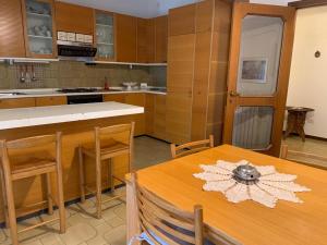 Kuchyňa alebo kuchynka v ubytovaní Casa Vacanze Via Giulia