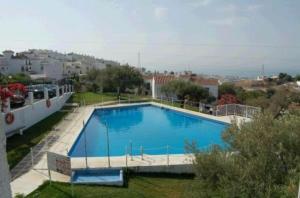 Bazén v ubytovaní Garden Apartment, La Noria alebo v jeho blízkosti