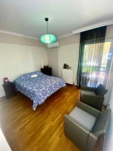 Posezení v ubytování Comfort & Care - spacious flat in Marousi
