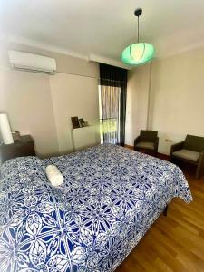 Postel nebo postele na pokoji v ubytování Comfort & Care - spacious flat in Marousi