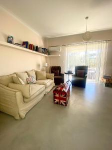 Posezení v ubytování Comfort & Care - spacious flat in Marousi