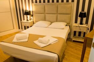 Posteľ alebo postele v izbe v ubytovaní AB Apartamentos Museum