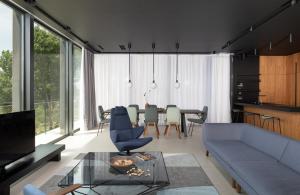 a living room with a couch and a table at Villa Albina & Domenica in Zadar