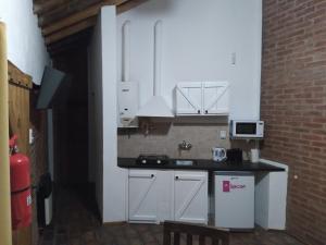 Una cocina o kitchenette en Cabañas Olivos y Bodegas