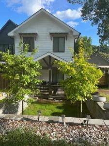 a white house with trees in front of it at Atlanta Unit 2 Room 2 - Peaceful Weekend Getaway Private Bedroom & Bathroom in Atlanta