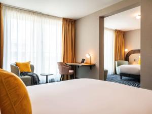 Ліжко або ліжка в номері Mercure Amsterdam North Station