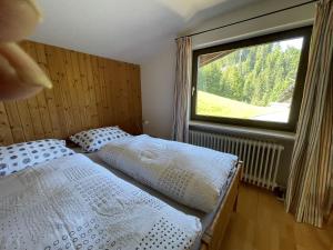 Postel nebo postele na pokoji v ubytování Gruppenferienwohnung am Auweg